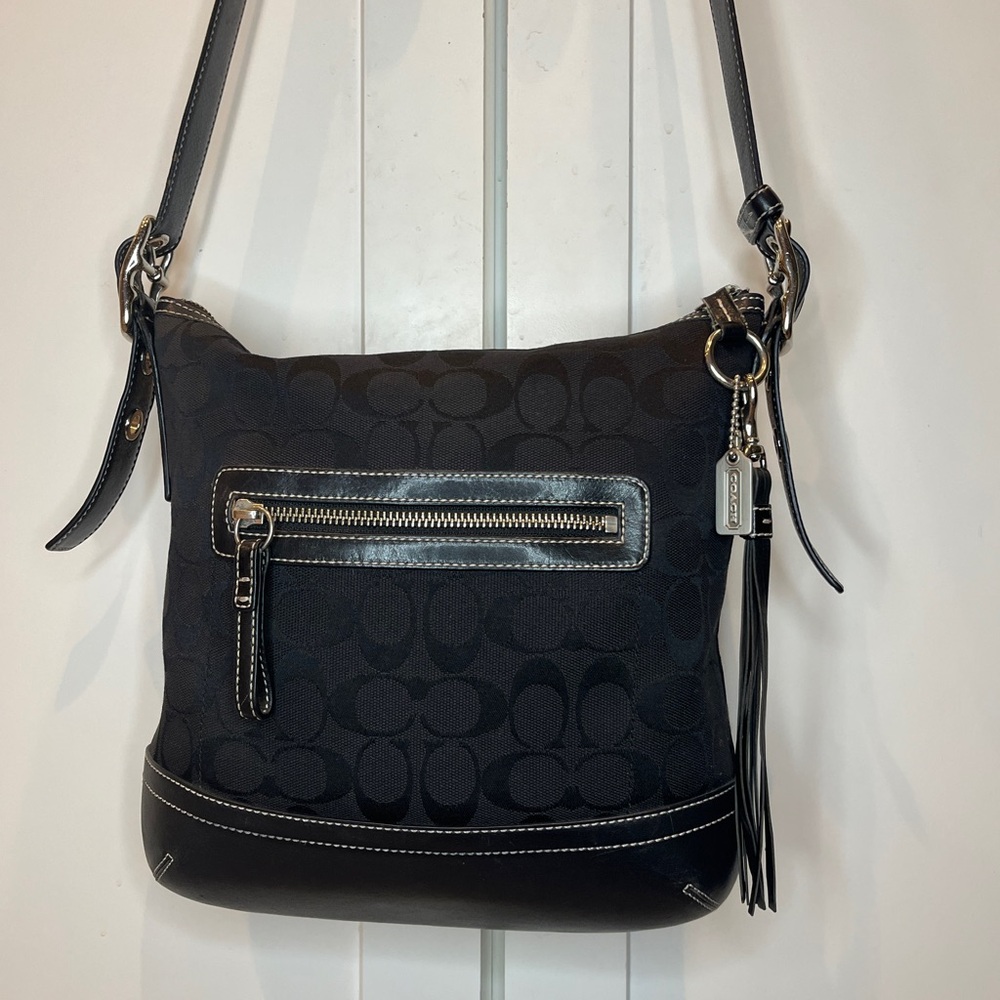 Genuine Coach black fabric and leather cross body handbag. Great condition.
